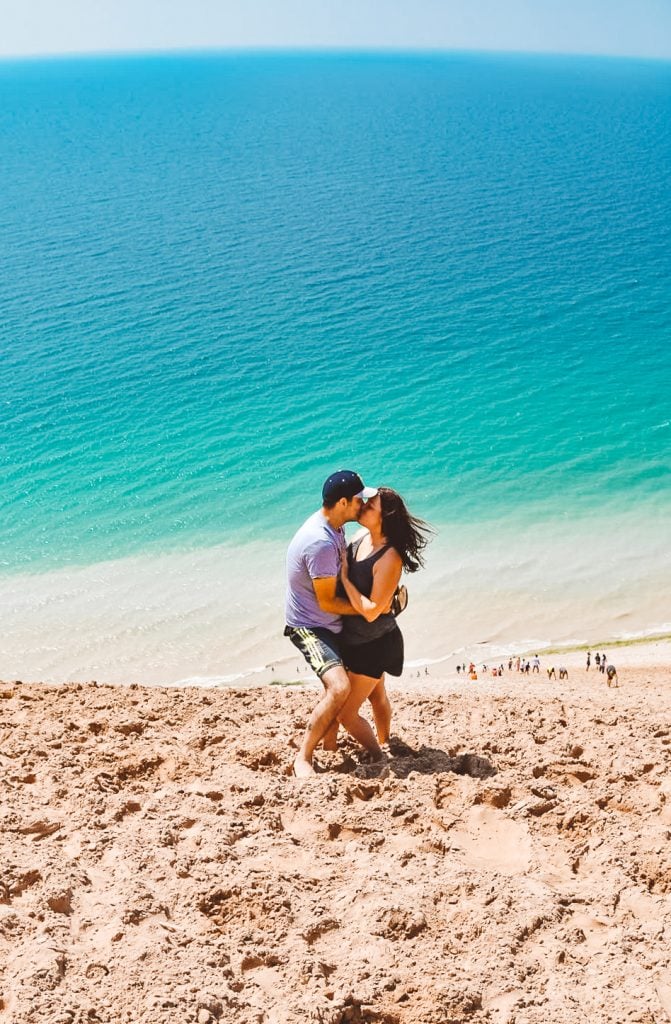 This Sleeping Bear Dunes itinerary covers the best of what to do on the National Lakeshore, how to get there and where to stay. Add this hidden gem to your summer bucket list. | Her Life Adventures | #camping #usdestinations #travelhacks #travelguide #adventuretravel #roadtrip #nationalpark #nationalparkroadtrip #michigantravel #greatlakes #ustravel #summer #bucketlist #sleepingbear #lakemichigan #sanddunes