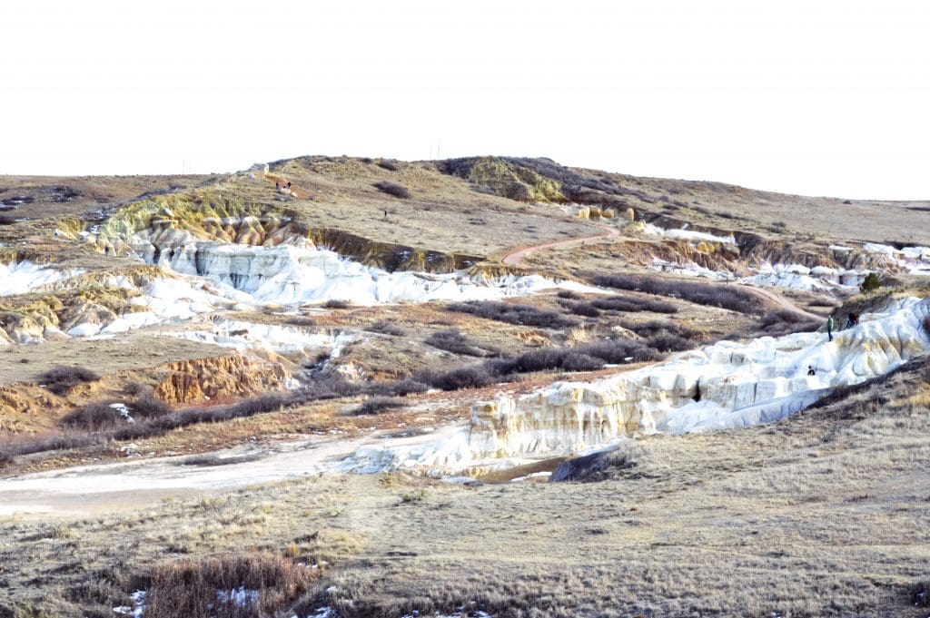 Discover Colorado's hidden gem, the Paint Mines Interpretive Park. Rainbow colored formations just outside of Colorado Springs. #rainbow #paintmines #coloradoparks #hiddengem #paintminespark