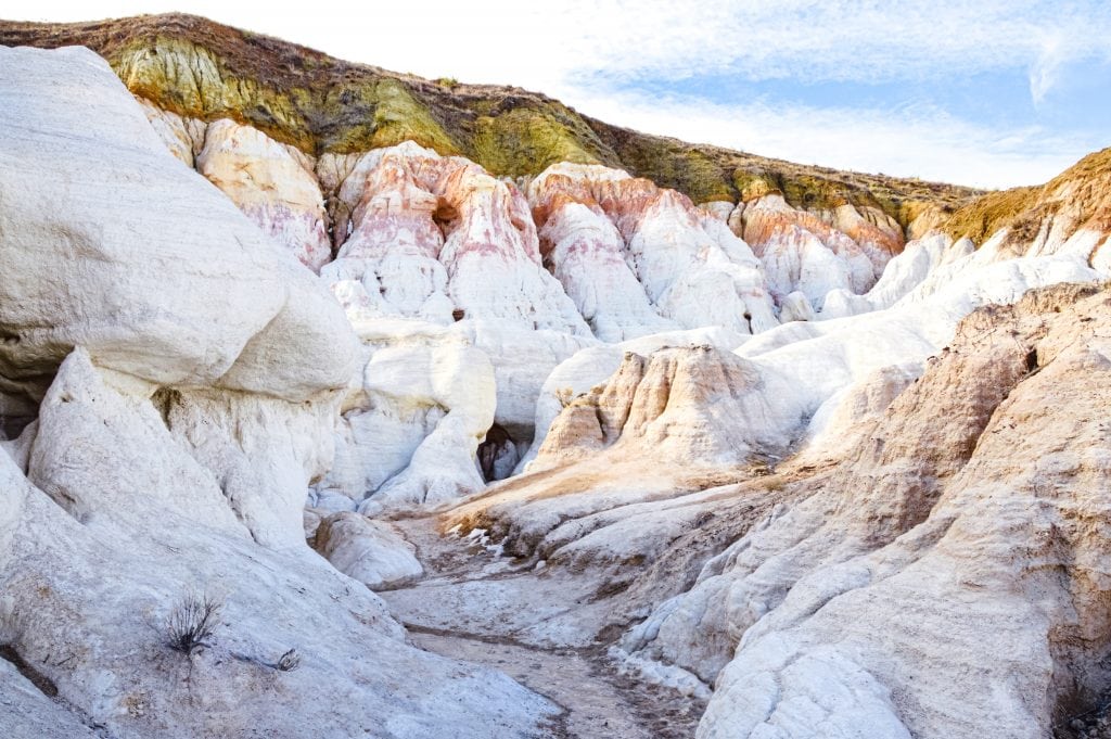 Discover Colorado's hidden gem, the Paint Mines Interpretive Park. Rainbow colored formations just outside of Colorado Springs. #rainbow #paintmines #coloradoparks #hiddengem #paintminespark