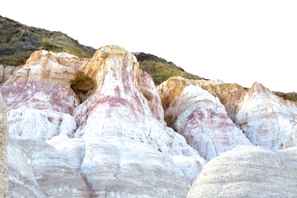 Discover Colorado's hidden gem, the Paint Mines Interpretive Park. Rainbow colored formations just outside of Colorado Springs. #rainbow #paintmines #coloradoparks #hiddengem #paintminespark