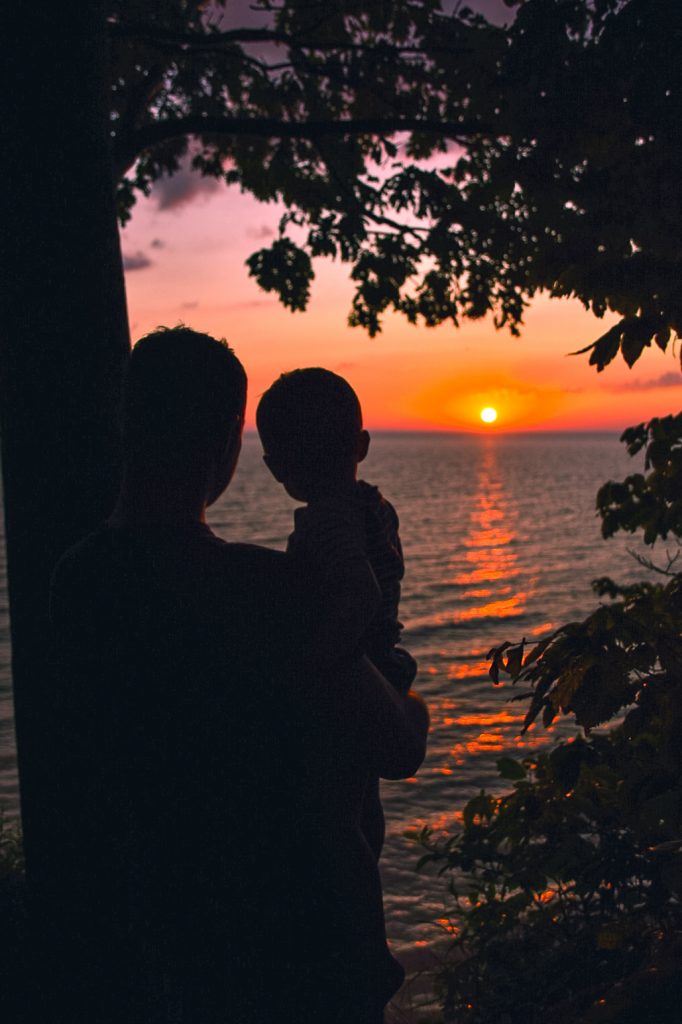 This Sleeping Bear Dunes itinerary covers the best of what to do on the National Lakeshore, how to get there and where to stay. Add this hidden gem to your summer bucket list. | Her Life Adventures | #camping #usdestinations #travelhacks #travelguide #adventuretravel #roadtrip #nationalpark #nationalparkroadtrip #michigantravel #greatlakes #ustravel #summer #bucketlist #sleepingbear #lakemichigan #sanddunes
