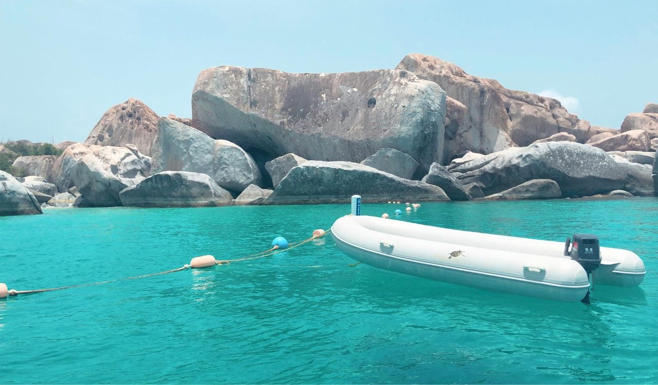 White Inflatable Boat on Body of Water