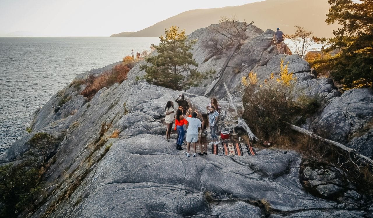 People Standing on Rock Formations
