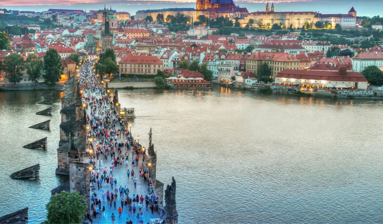 People Walking on Concrete Bridge