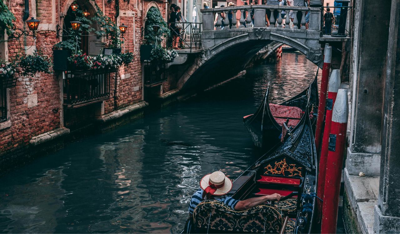 Photo of Man Riding Canoe