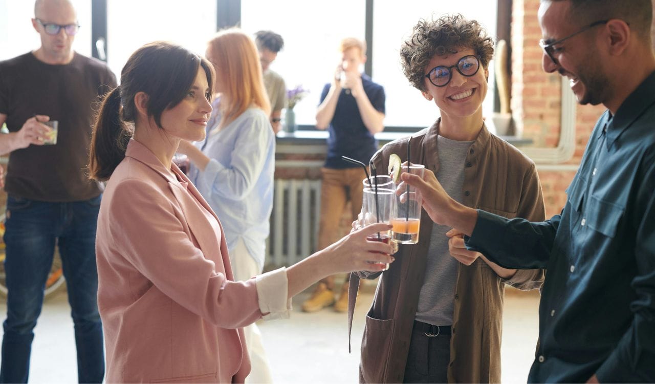 Photo Of People Holding Glasses