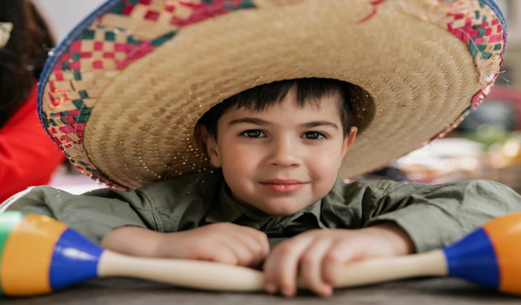 A Handsome Boy Wearing a Sombrero