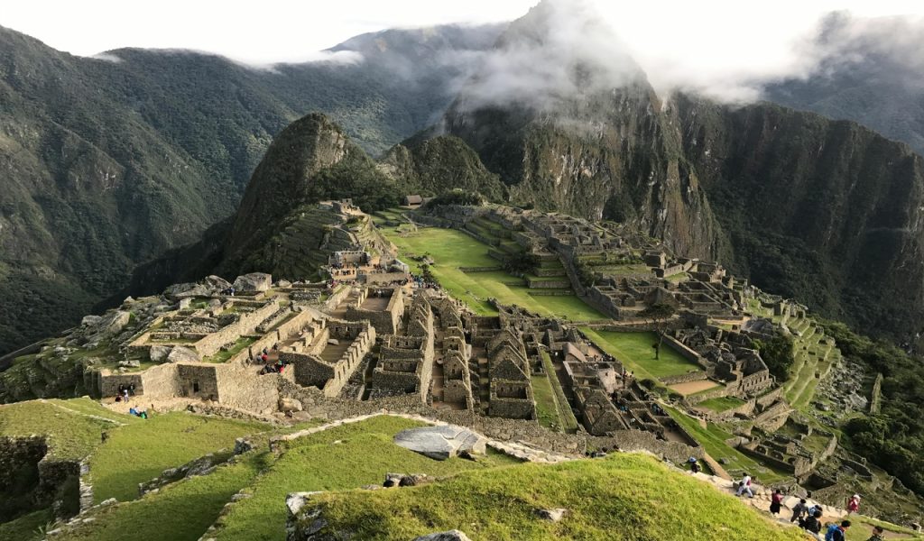 15 Bucket-List Destinations Frequent Travelers Love – Her Life Adventures Mountain and Houses