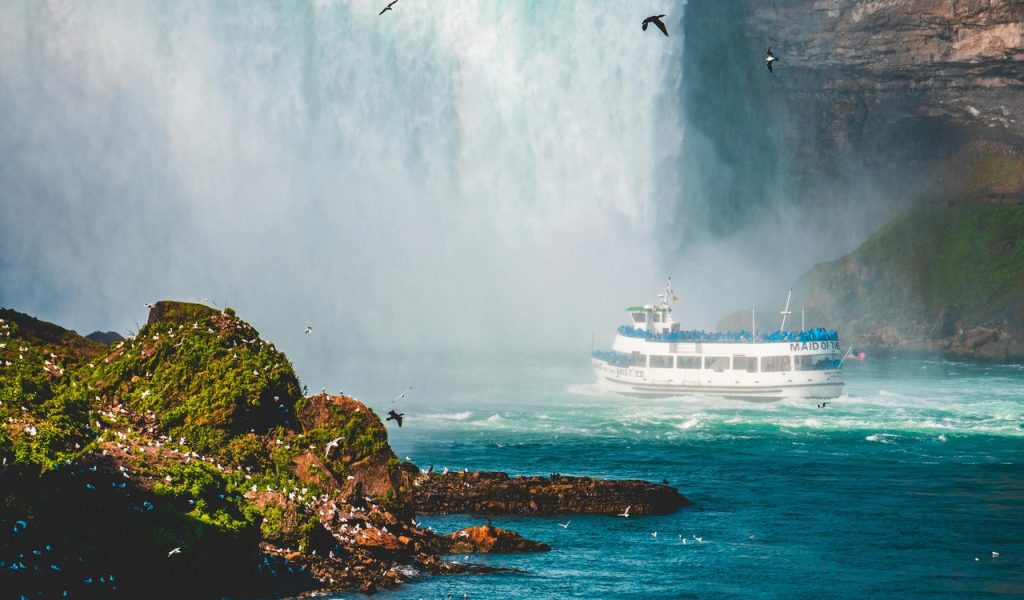 13 U.S. Islands You Can Reach By Ferry For Easy Weekend Escapes – Her Life Adventures Photo of Ship Near Waterfalls