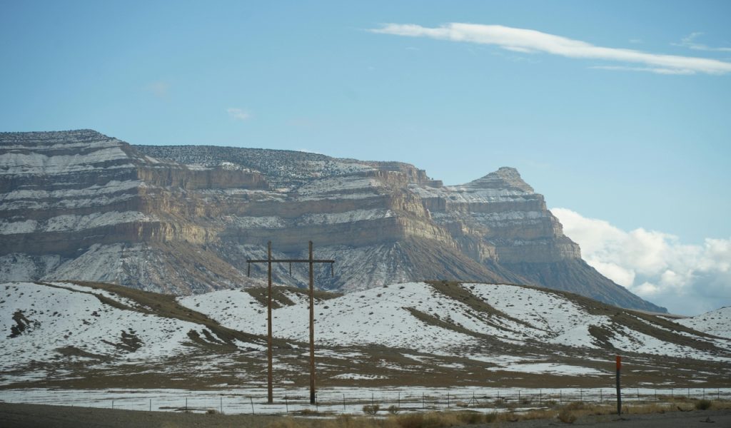 Snow-Dusted Mountain Landscape with Clear Sky