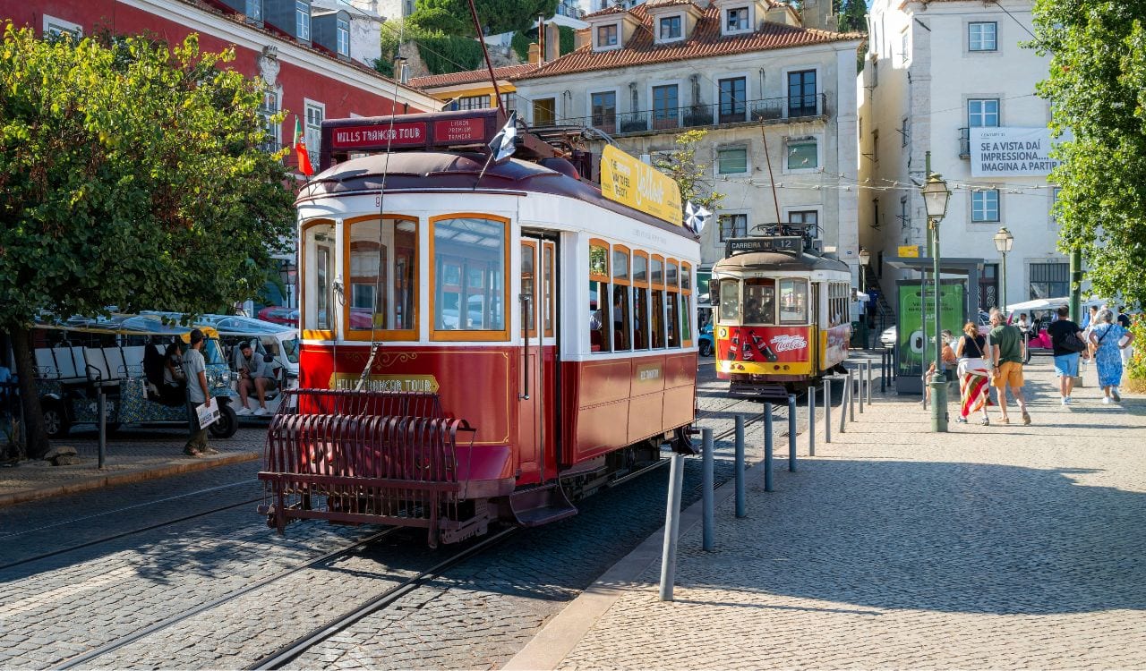 Lisbon Tram in Historic Alfama District on a Sunny Day