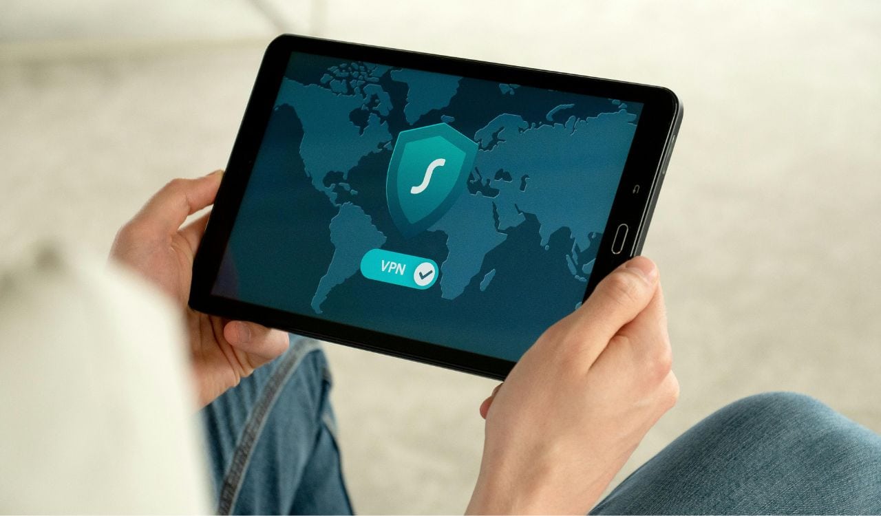 Person Holding A Tablet