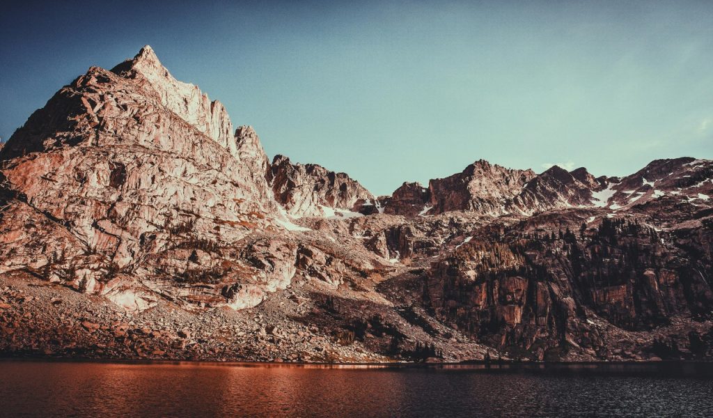Brown Rocky Mountain Under a Calm Blue Sky