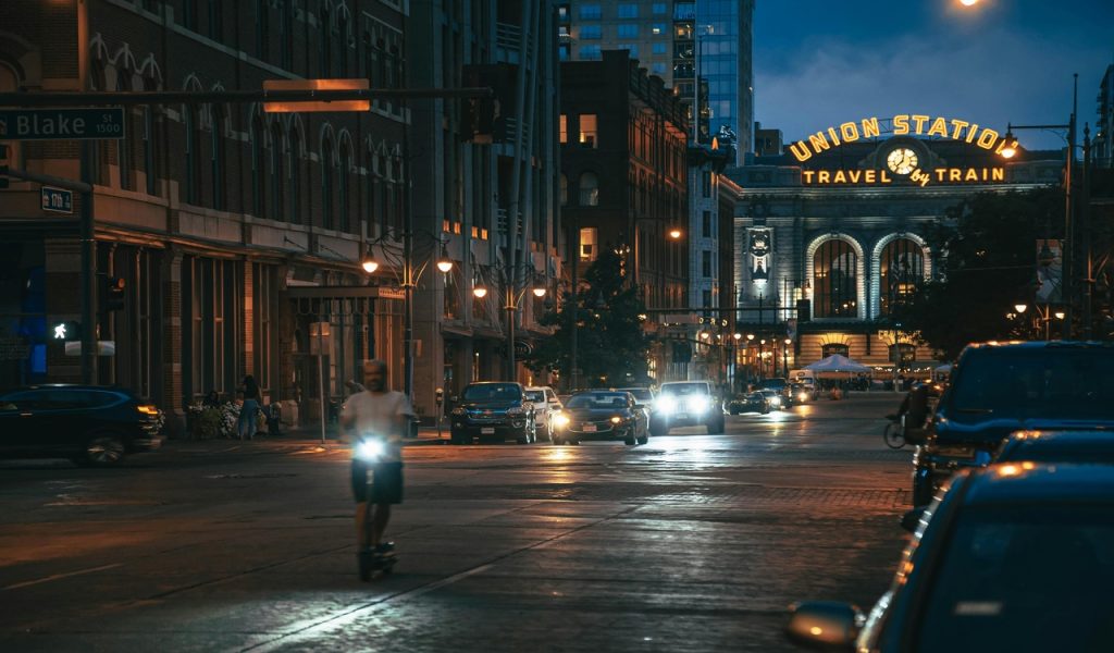 People Walking on Pedestrian Lane during Night Time 