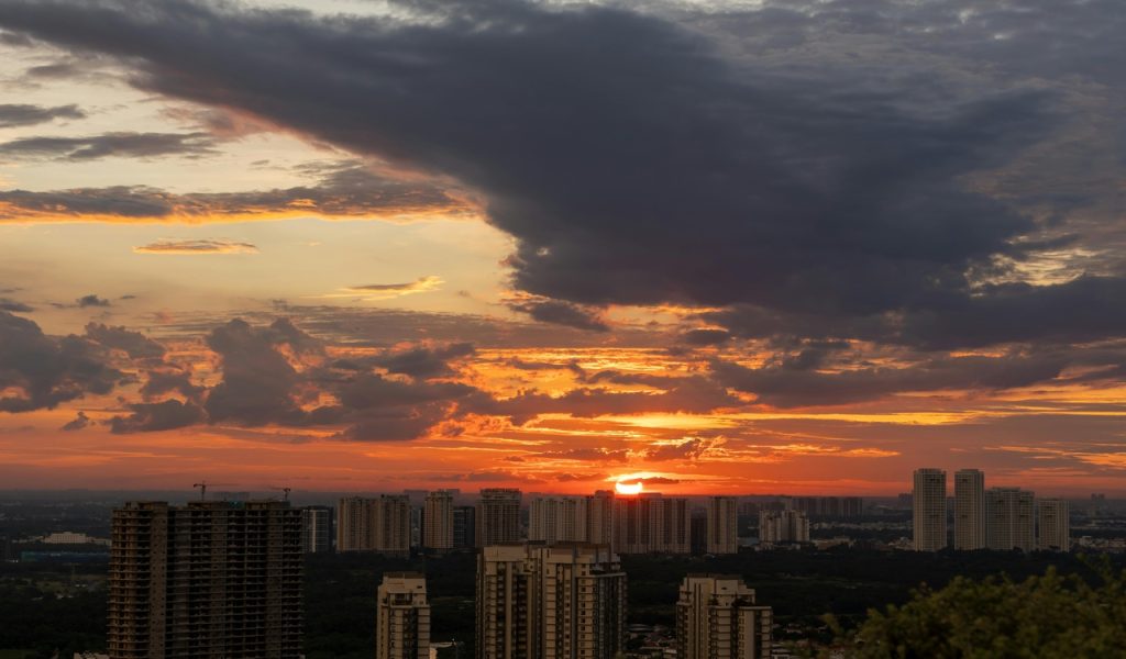 Cityscape with Dramatic Sunset Skyline

