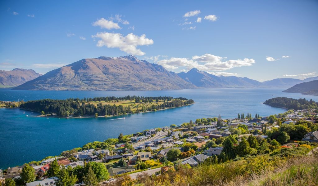 15 Bucket-List Destinations Frequent Travelers Love – Her Life Adventures Green Island in the Middle of the Lake during Daytime