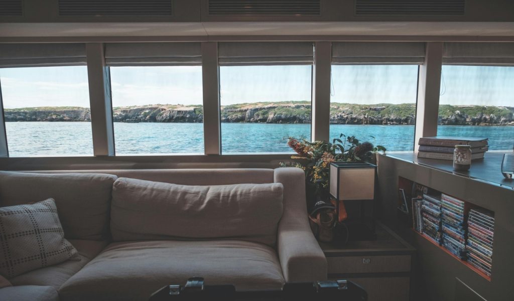 Interior of modern yacht with cozy couch