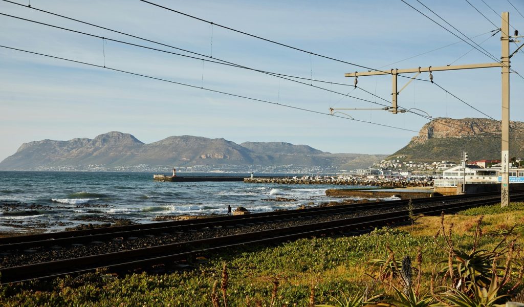 9 Countries With the Most Stunning Train Journeys – Her Life Adventures Train Rails Running Along Seacoast