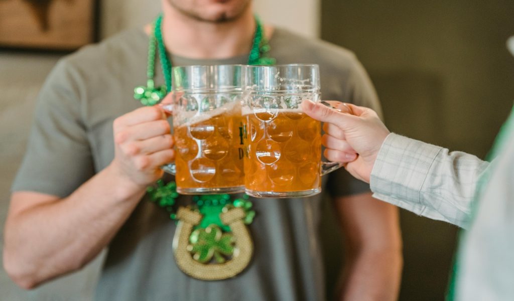 11 U.S. Cities Beer Lovers Should Put on the Map – Her Life Adventures Hands Toasting Clear Glass Mugs With Brown Liquid