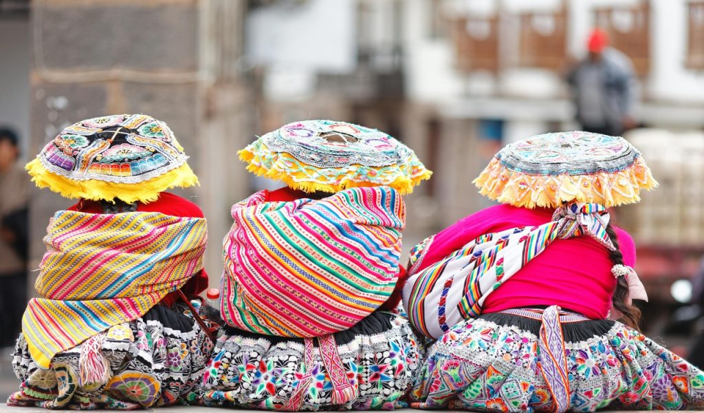 Peruvian women with traditional clothes in Cusco
