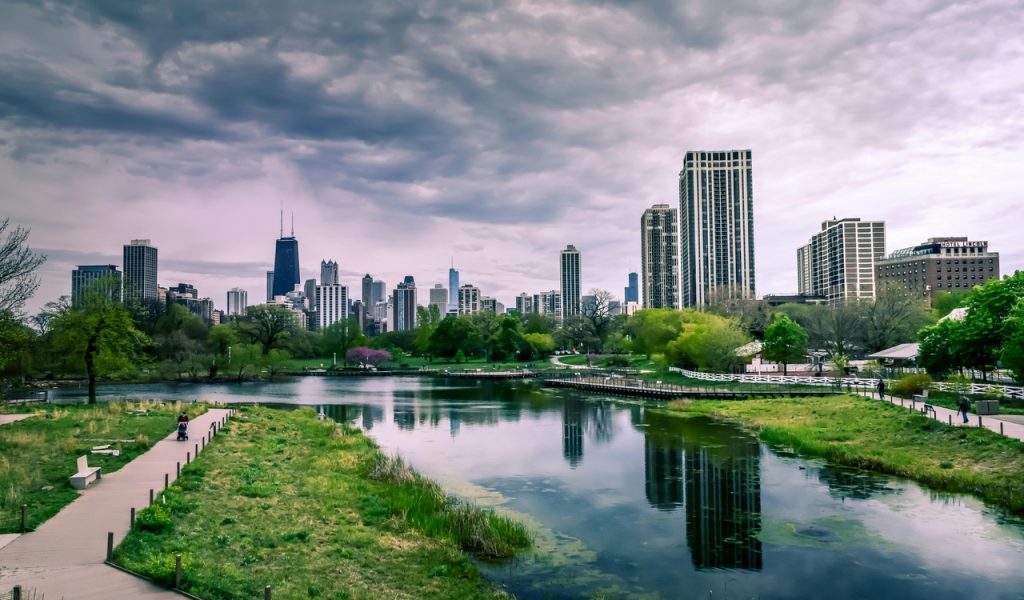 14 Weekend Road Trips Under 300 Miles From Major U.S. Hubs – Her Life Adventures River Near City Buildings Under Cloudy Sky