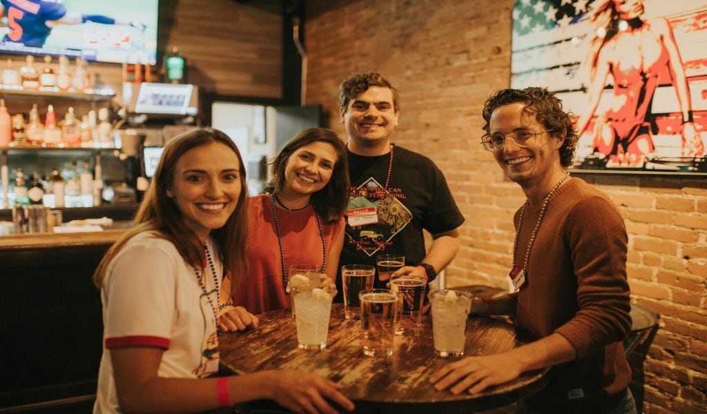 11 U.S. Cities Beer Lovers Should Put on the Map – Her Life Adventures Photograph of a Group of Friends Having a Drink
