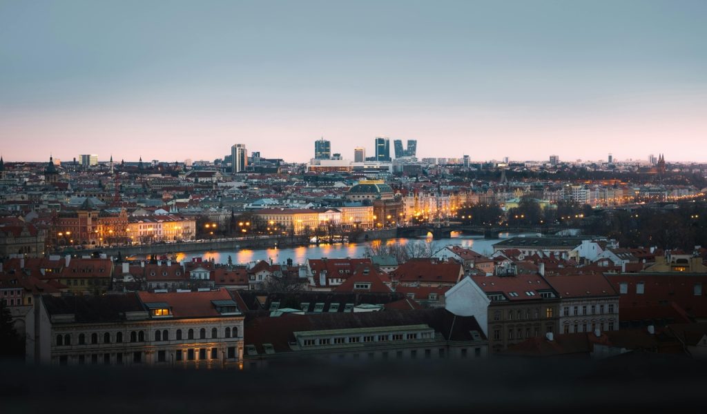 15 Bucket-List Destinations Frequent Travelers Love – Her Life Adventures Prague cityscape from the top of a hill
