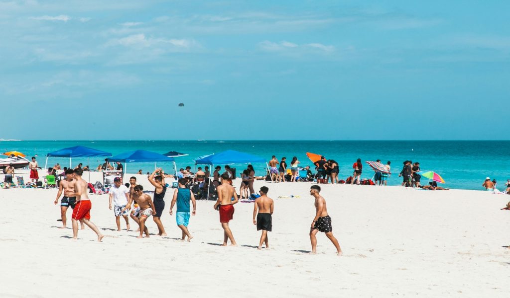14 Weekend Road Trips Under 300 Miles From Major U.S. Hubs – Her Life Adventures People on Beach