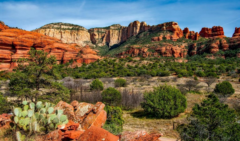 10 Spots Where Travelers Keep Reporting UFO Sightings – Her Life Adventures Green Leafed Plants Surrounded by Mountains