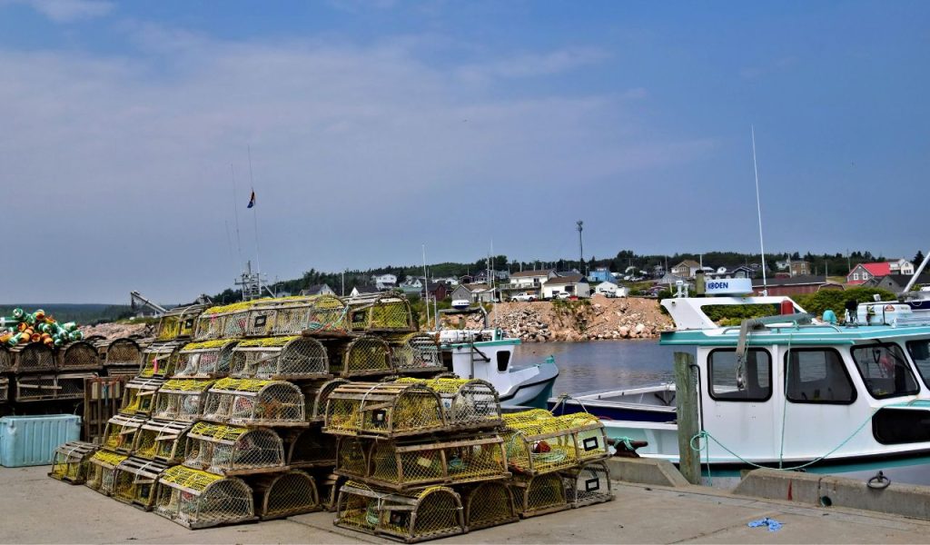 Lobster Traps and Boats at Nova Scotia Harbor 