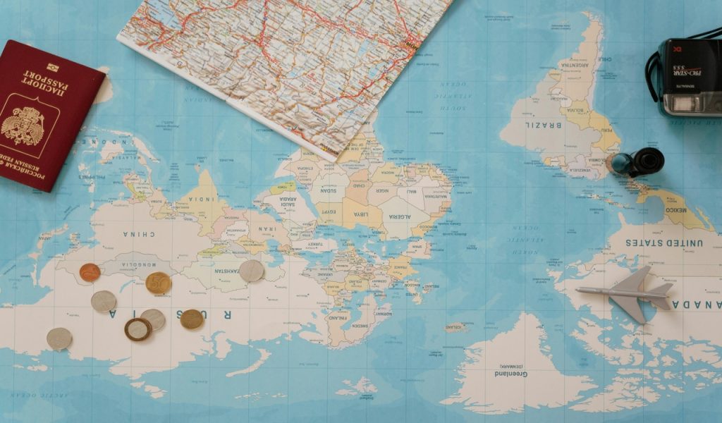 Coins on a Map with Passport