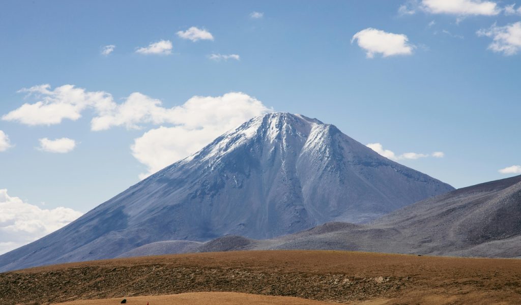 10 Spots Where Travelers Keep Reporting UFO Sightings – Her Life Adventures A Snow-Covered Mountain Under Blue Sky