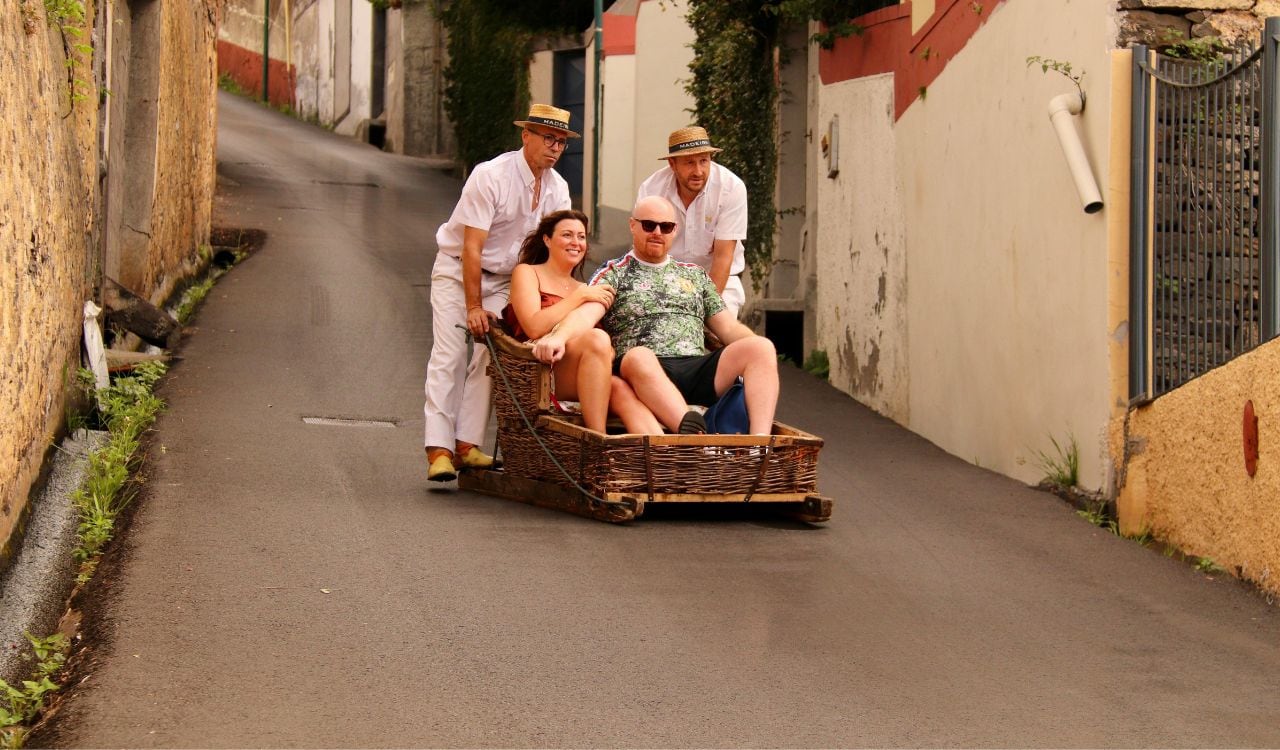 Traditional Toboggan Ride in Funchal Street