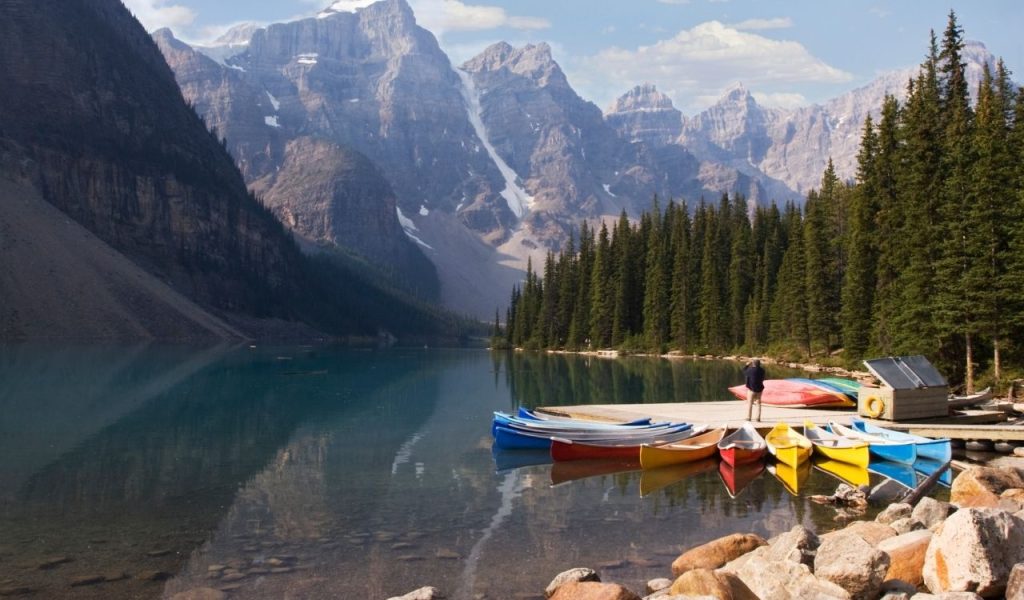 Lake Moraine and colorful canoes, Rocky Mountains
