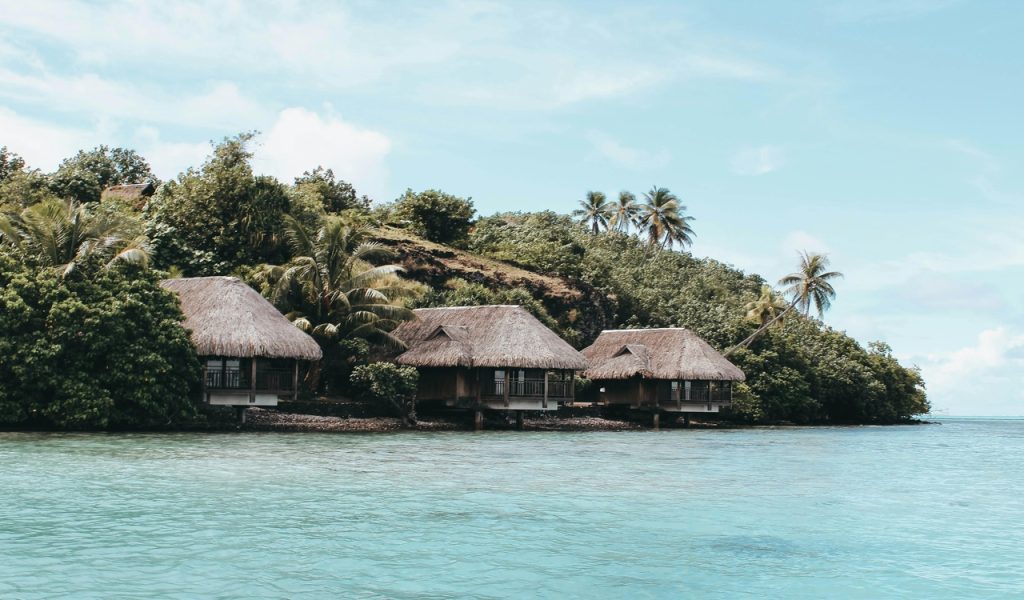 15 Bucket-List Destinations Frequent Travelers Love – Her Life Adventures Cottage Near Sea Shore