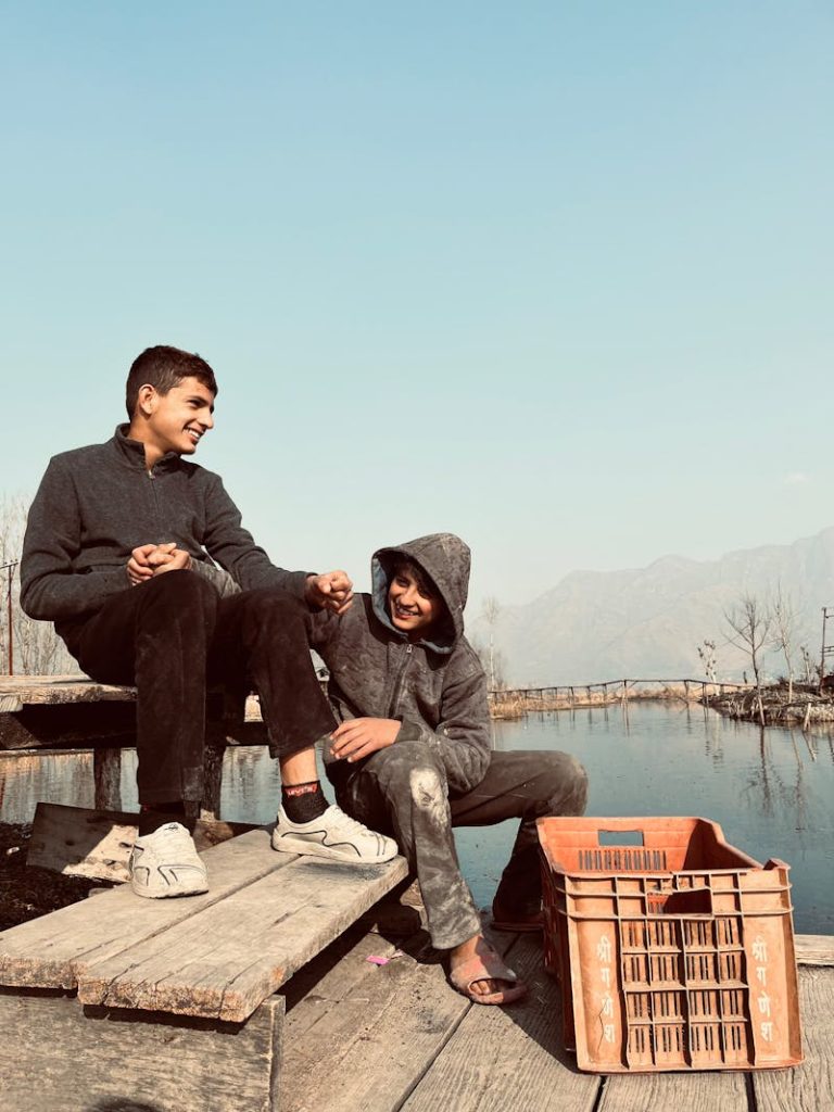 Joyful Moment by Srinagar's Serene Waterside