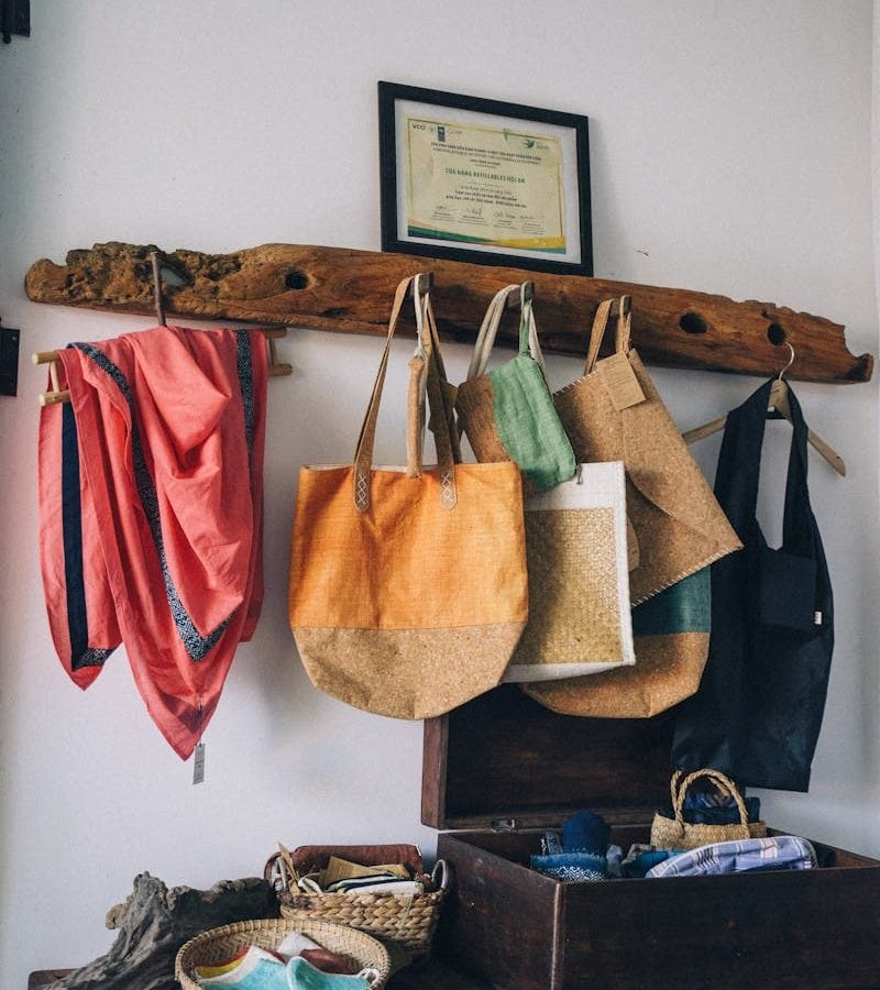 Reusable Shopping Bags Hanging on a Hanger Made of Salvaged Wood
