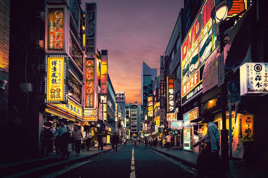 Asia’s Top 10 Must-Visit Destinations for 2025 – Her Life Adventures People Walking on Street Near Buildings