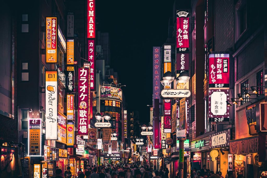 10 Countries With Rising Trip Costs And How To Budget For Them – Her Life Adventures People Walking on the Street of Japan