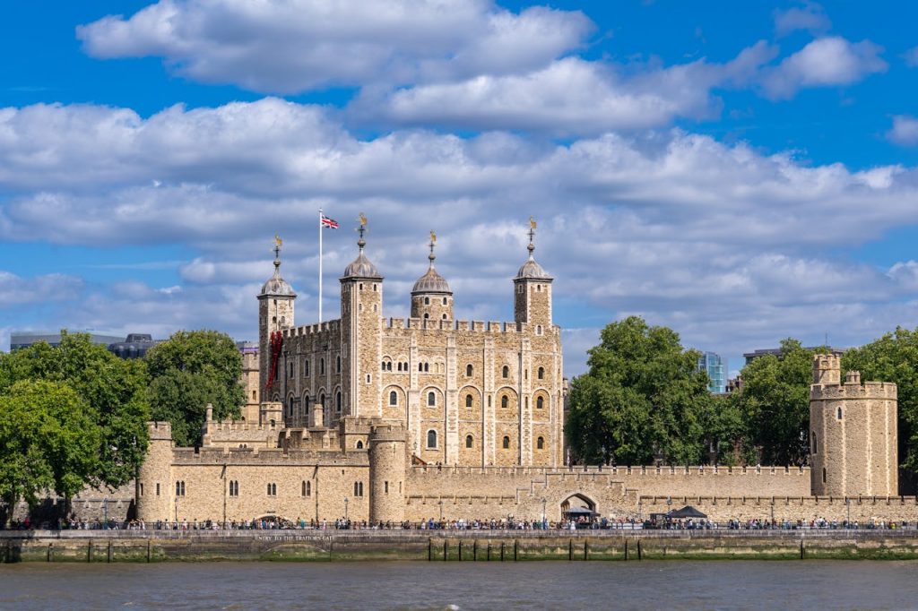 Tower of London by River Thames on a Sunny Day