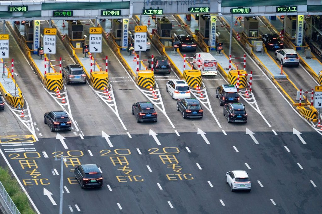 Aerial view of toll plaza with cars in lanes