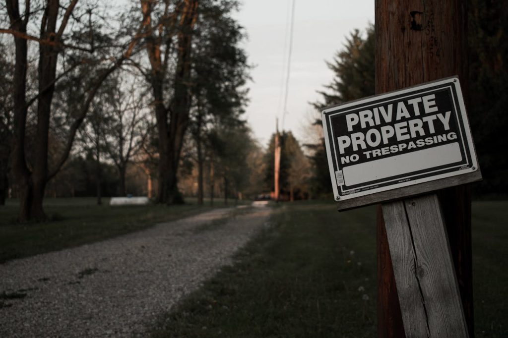 No Trespassing on Private Land Sign Board
