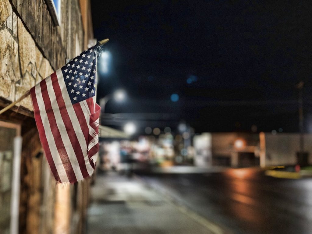 American Flag Hanging on the Wall

