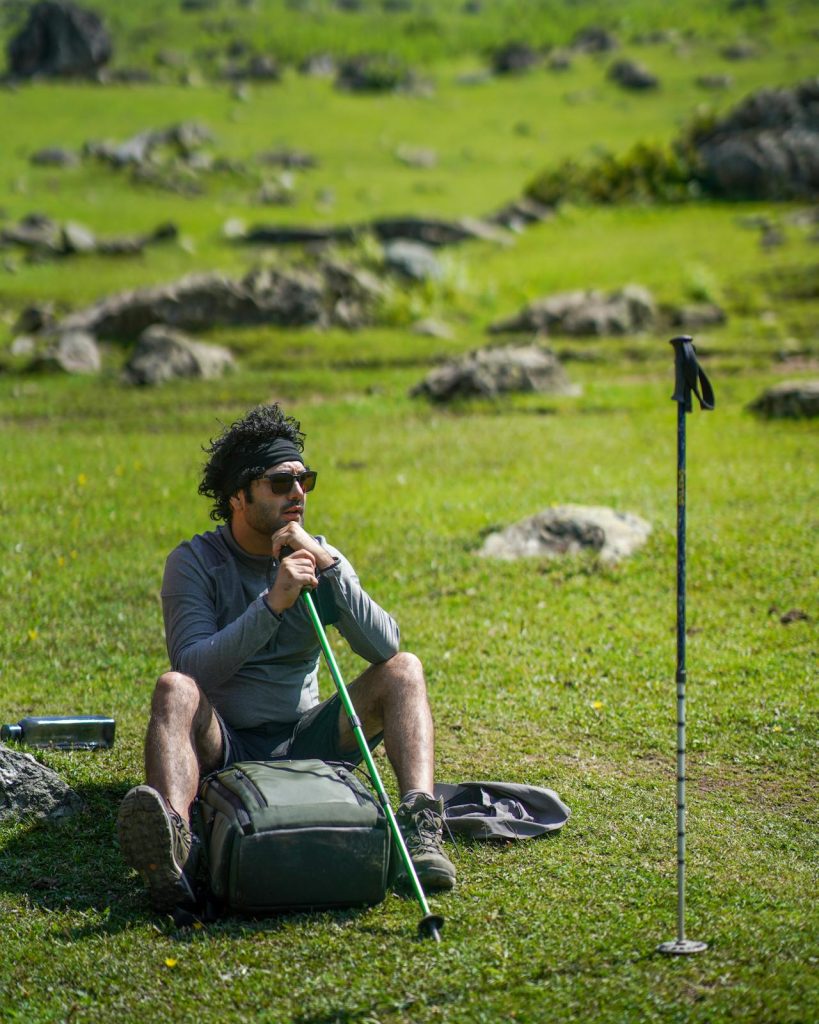 Exhausted hiker taking a break from altitude