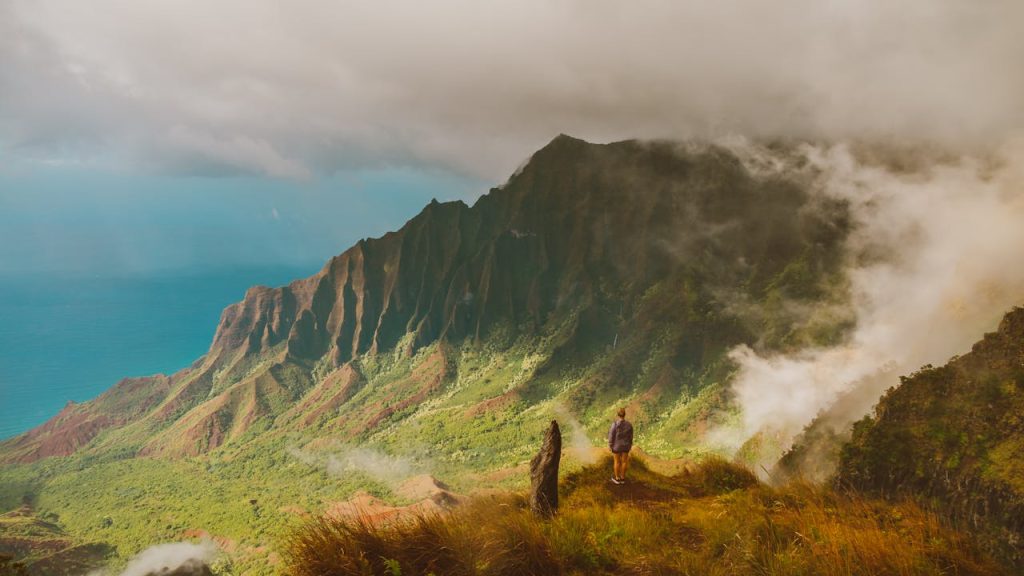Woman Standing on the Kalalau Lookout and Looking at the View