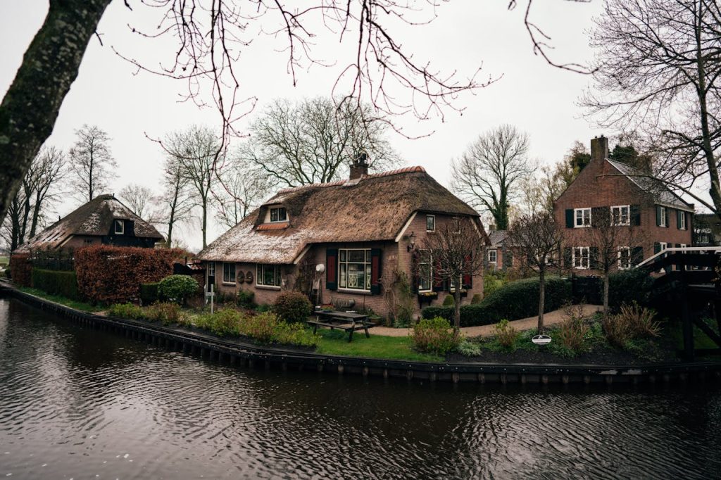 Houses by Canal in Giethoorn Village in Netherlands
