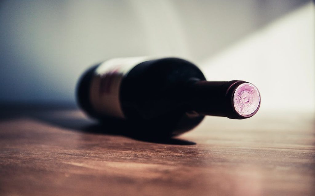 Bottle of wine on a table.