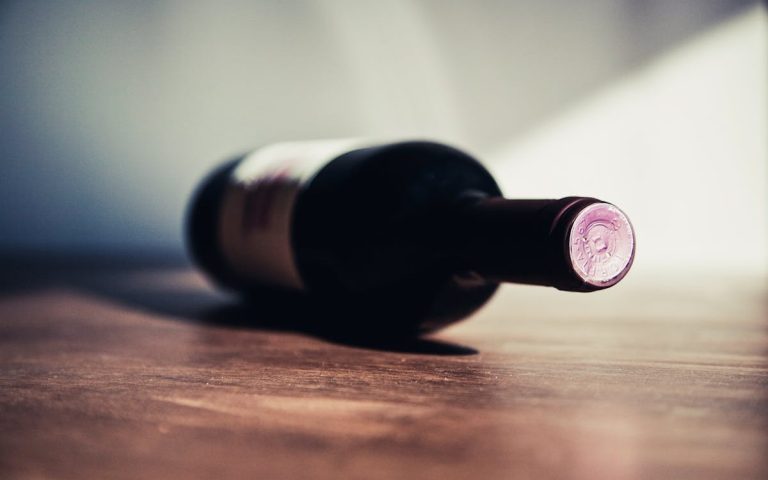 Bottle of wine on a table.