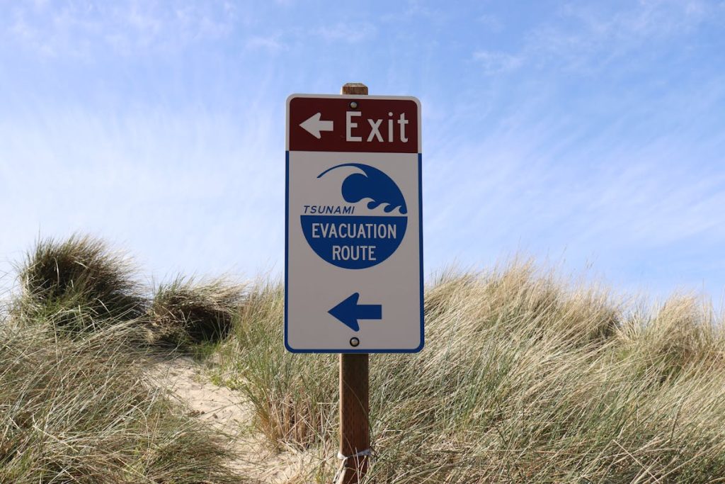 A Sign Showing the Direction of the Evacuation Route on the Beach