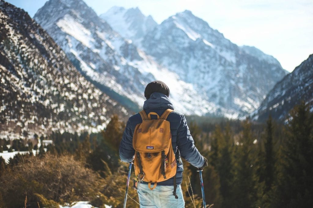 8 Travel Gear Items To Leave At Home For October Trips – Her Life Adventures A Person Hiking